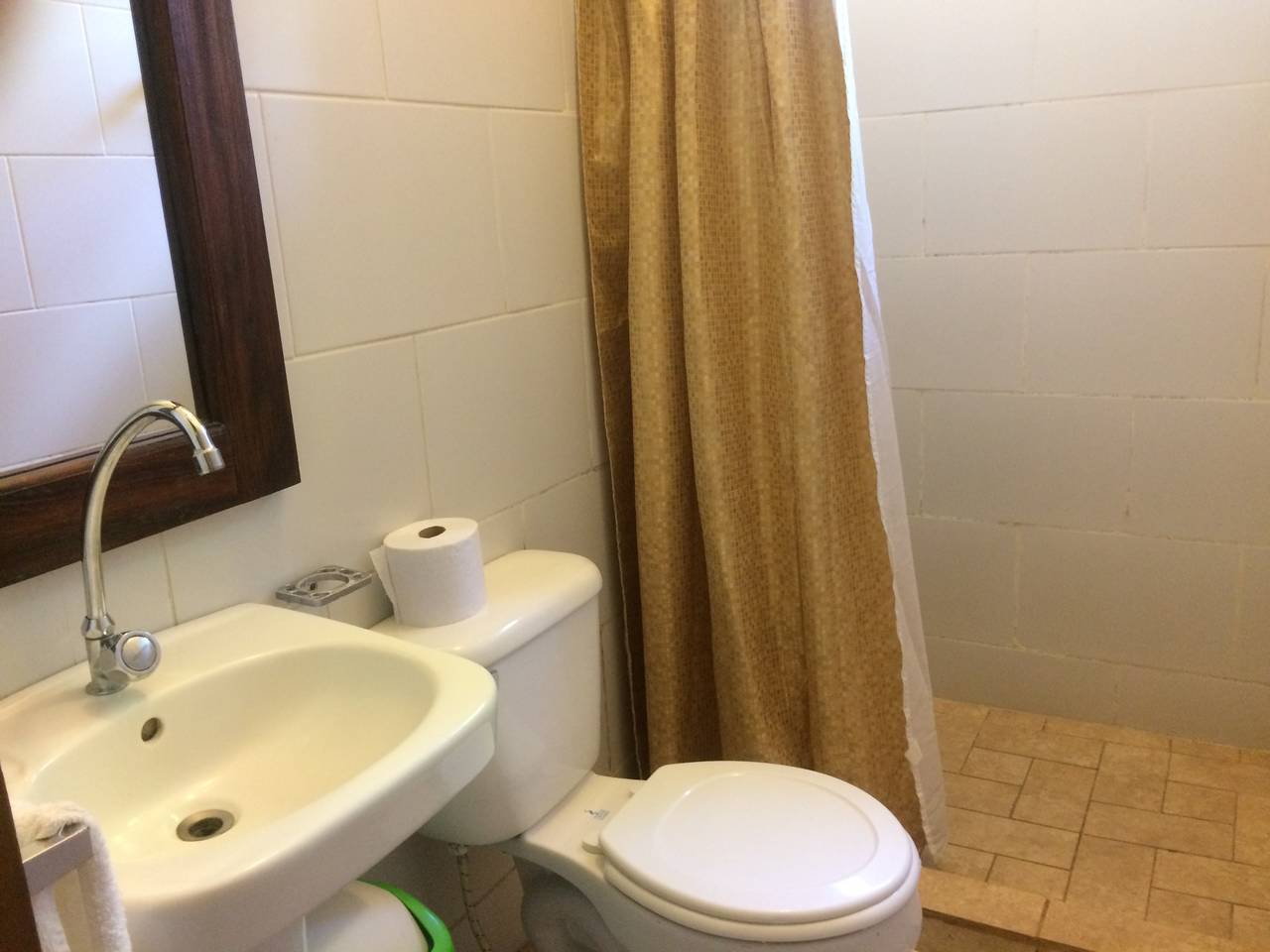 Shared bathroom with hot water shower
